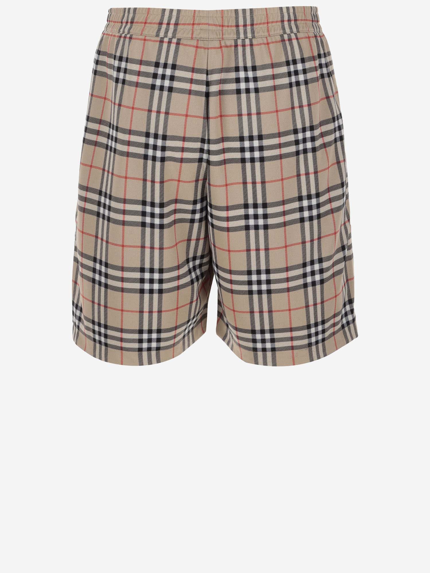 Shop Burberry Nylon Check Short Pants In Red