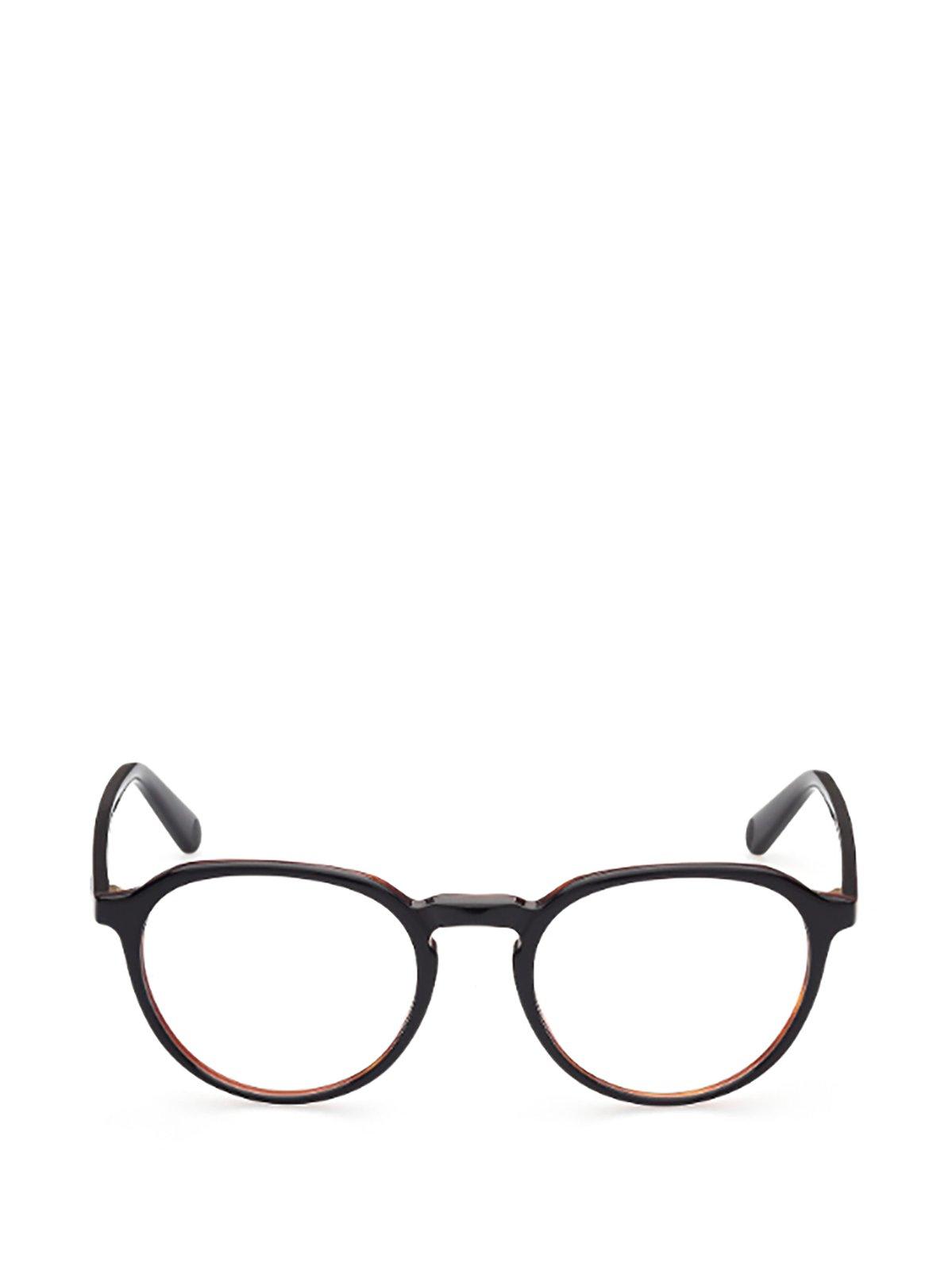 Shop Moncler Oval Frame Glasses In 005