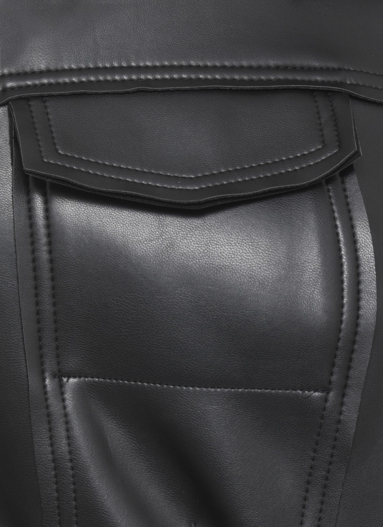 Norma Kamali Fitted Synthetic Leather Long Sleeve Jacket In Black