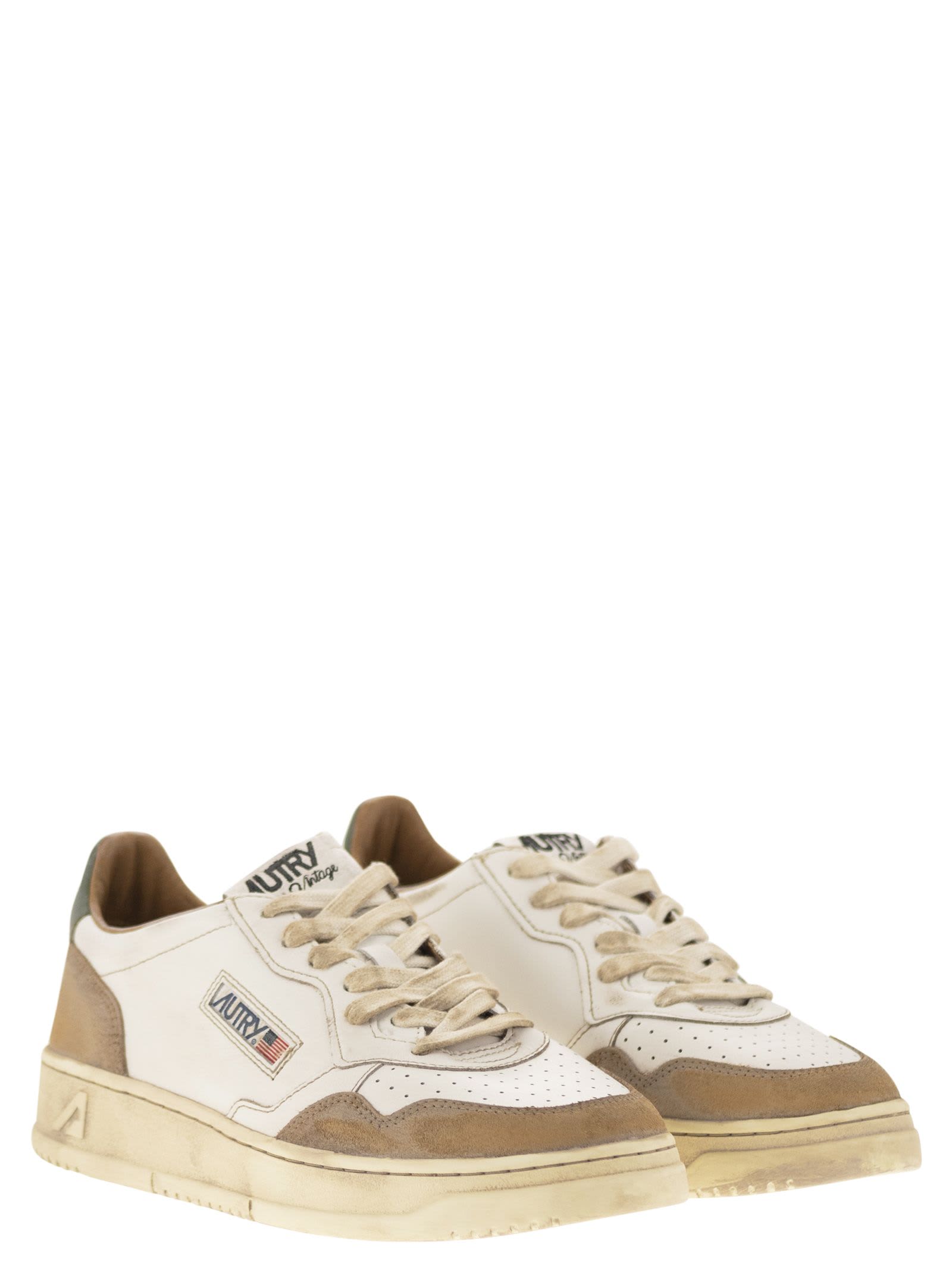 Shop Autry Super Vintage - Leather Sneakers In White/beige