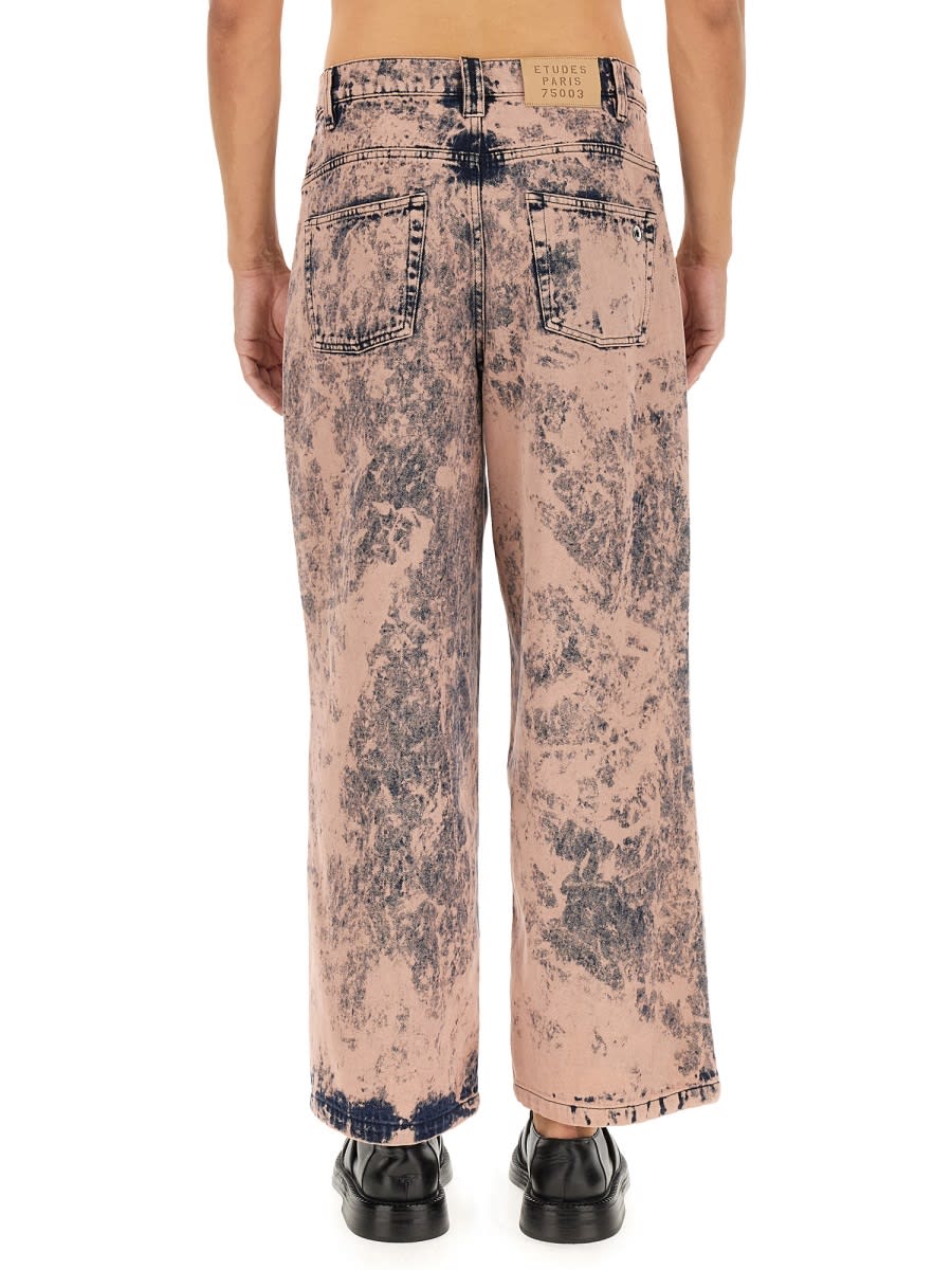 Shop Etudes Studio District Overdyed Jeans In Pink