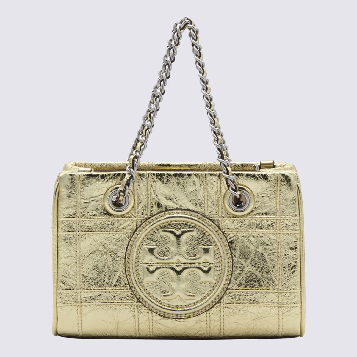 Shop Tory Burch Gold Metal Leather Mini Fleming Crossbody Bag In Golden