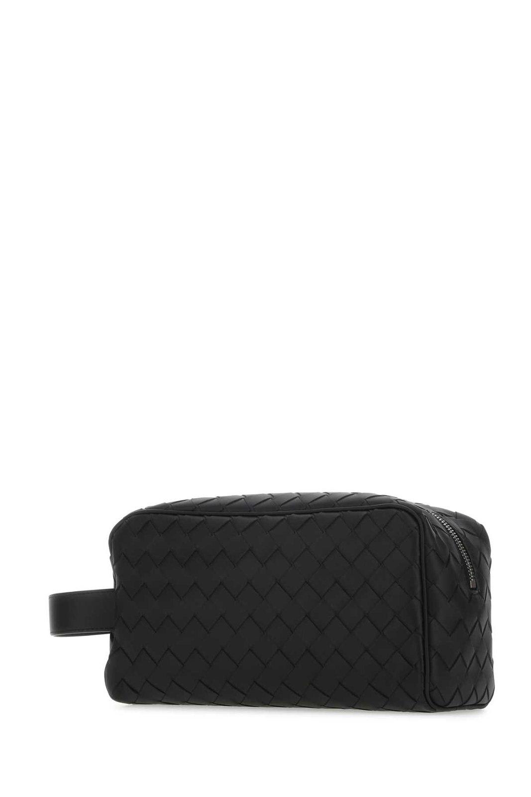 Shop Bottega Veneta Woven Zipped Makeup Bag In Black