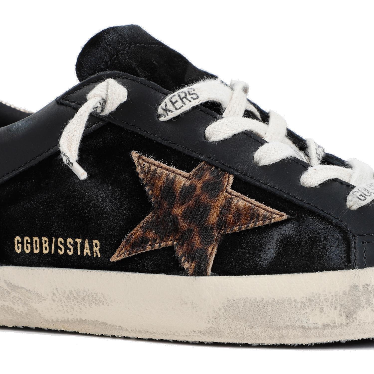 Shop Golden Goose Super-star Lace-up Sneakers In Black