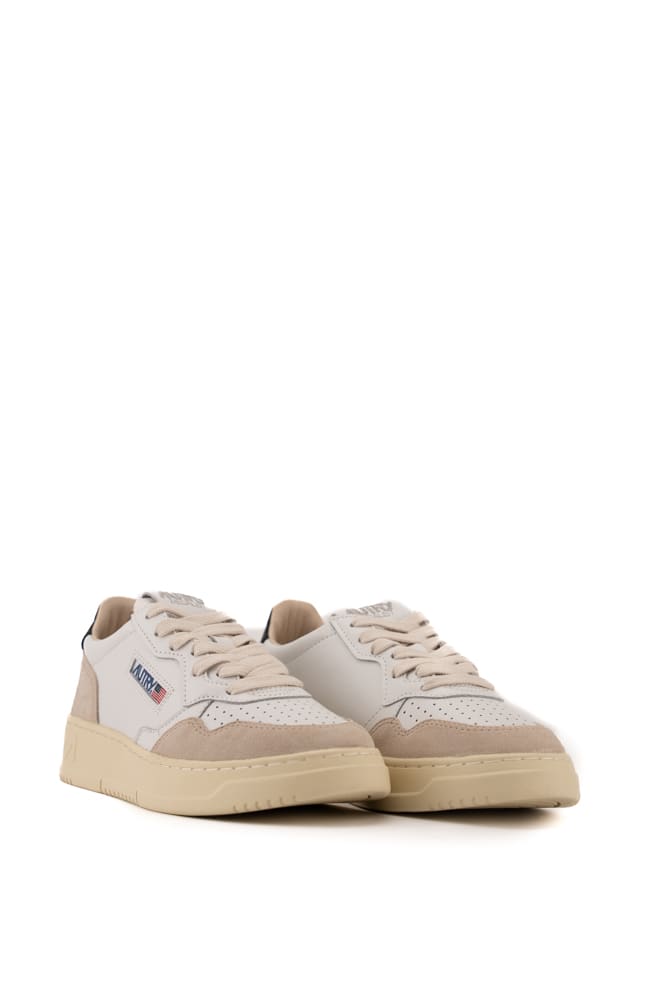 Shop Autry Medalist Low Sneakers In White/black Leather And Suede