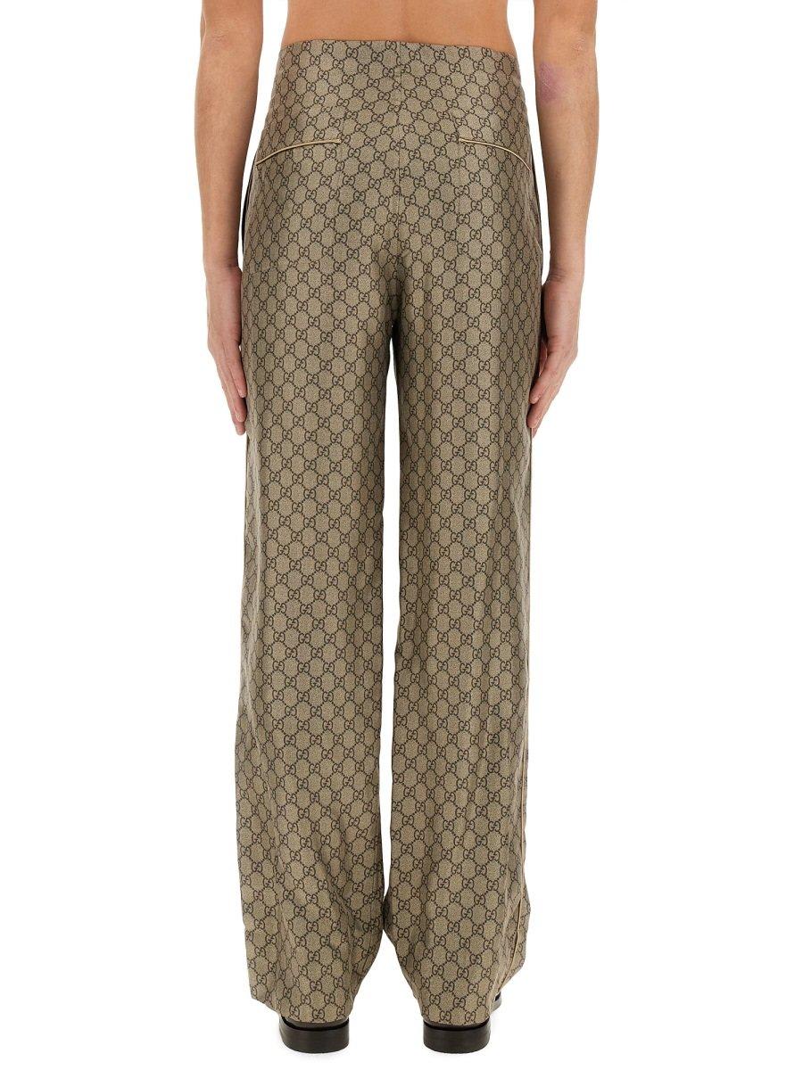 Shop Gucci Gg Supreme Printed Pants In Beige