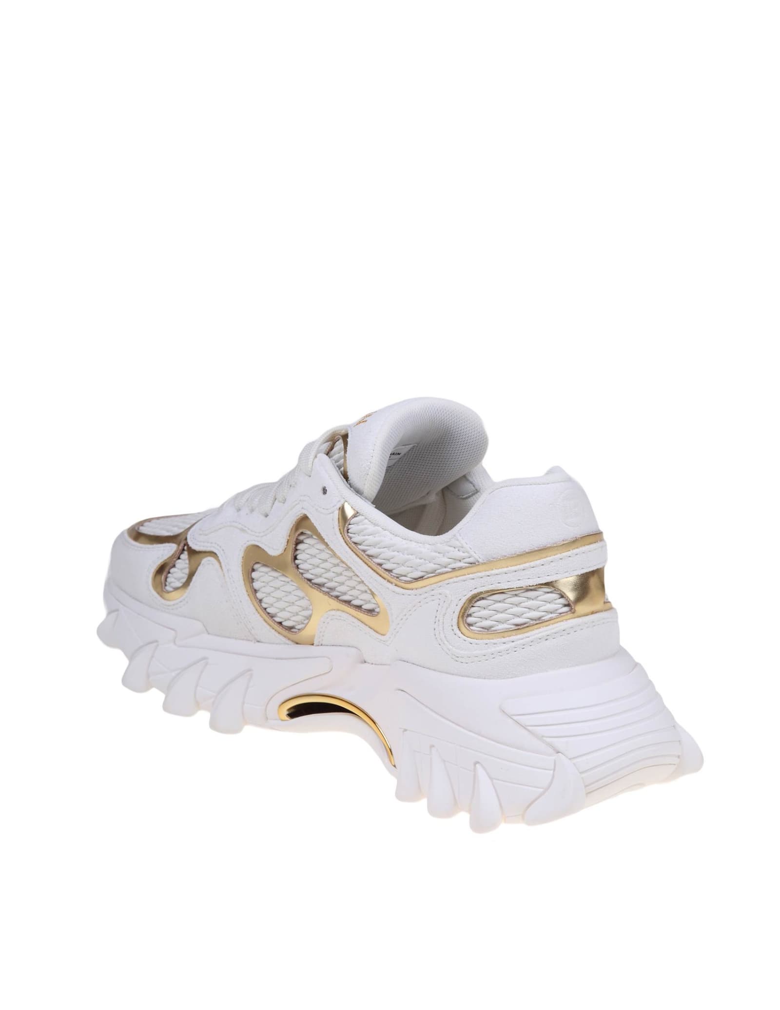Shop Balmain B-east Sneakers In White And Gold Suede And Leather In White/gold