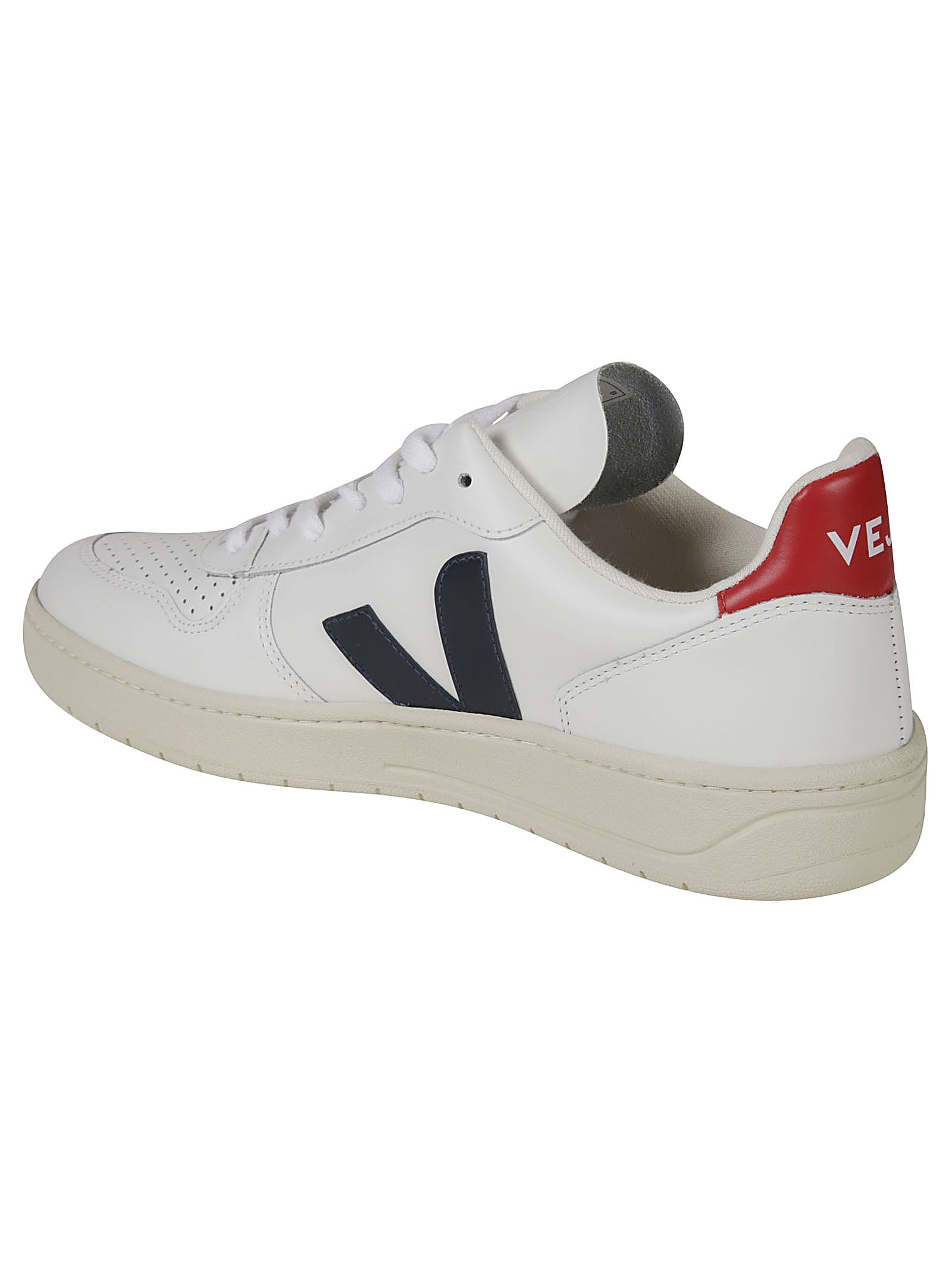 white sneakers with v on the side