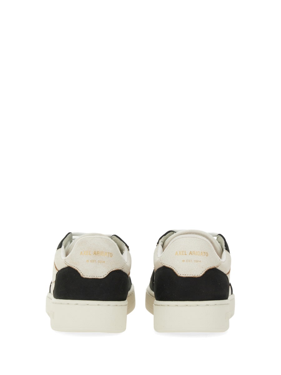 Shop Axel Arigato Sneaker Says It In White