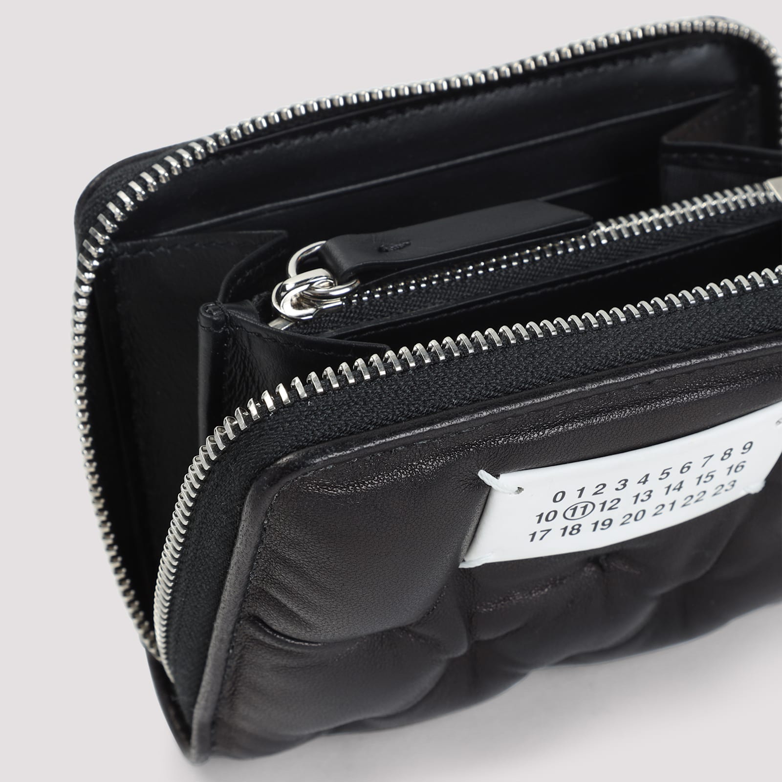 Maison Margiela Quilted Black Leather Zip Wallet With Contrasting Label In Black