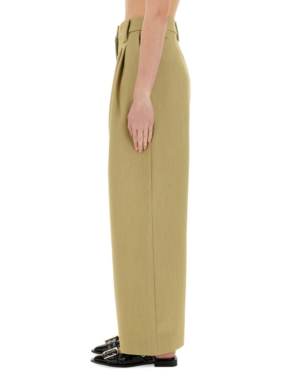 Ganni Mid-rise Pleated Wide-leg Pants In Beige