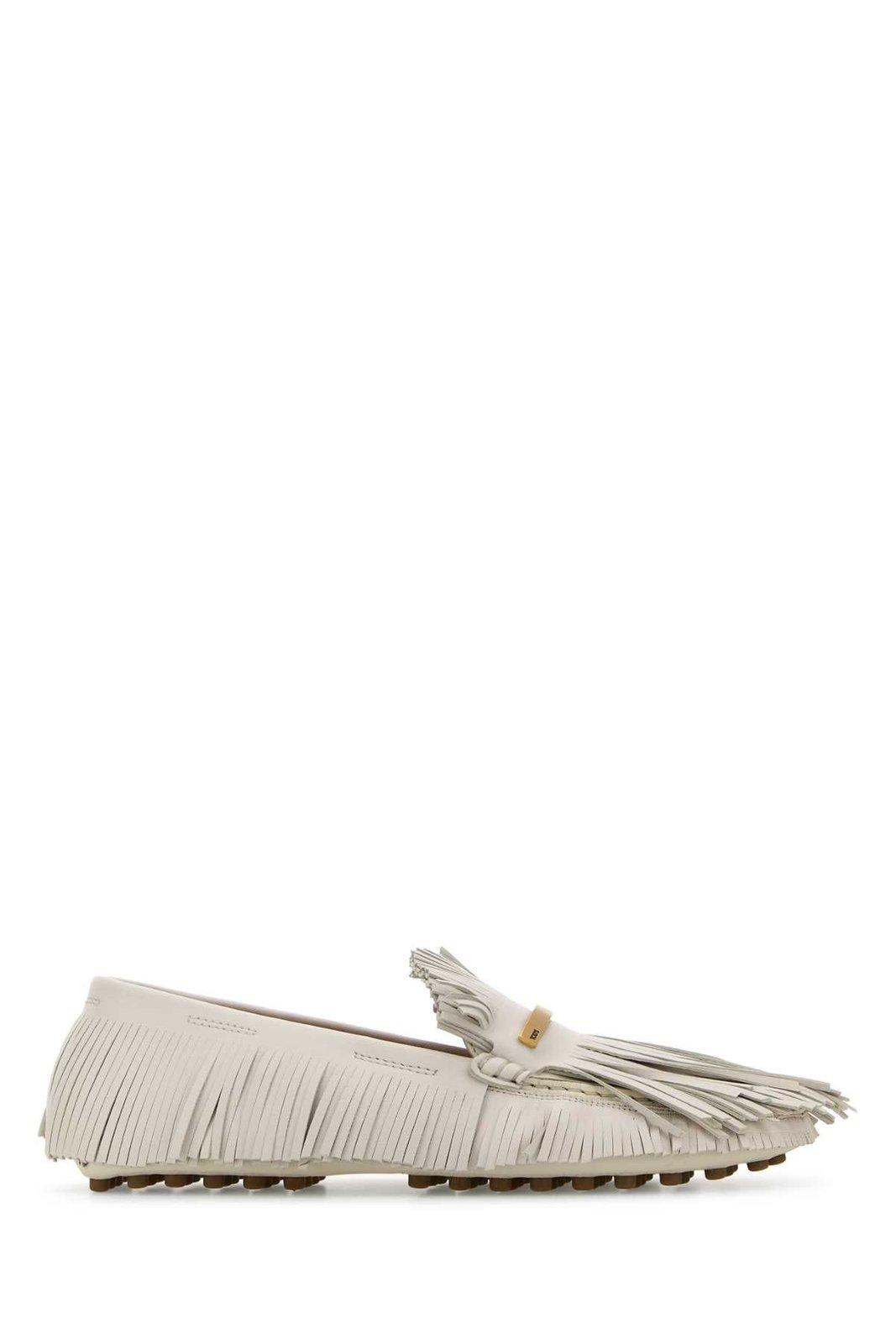 Shop Tod's Fringed Slip-on Loafers In B015