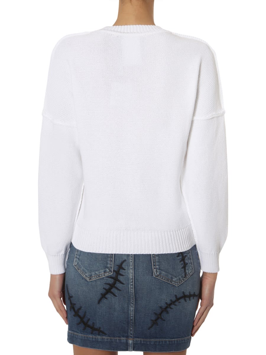 Shop Moschino Crew Neck Sweater In White