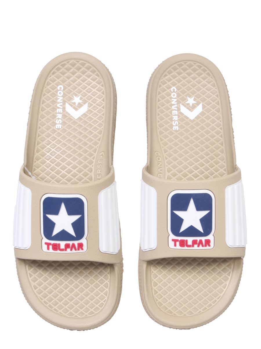 Shop Telfar Rubber Slide Sandals In Beige