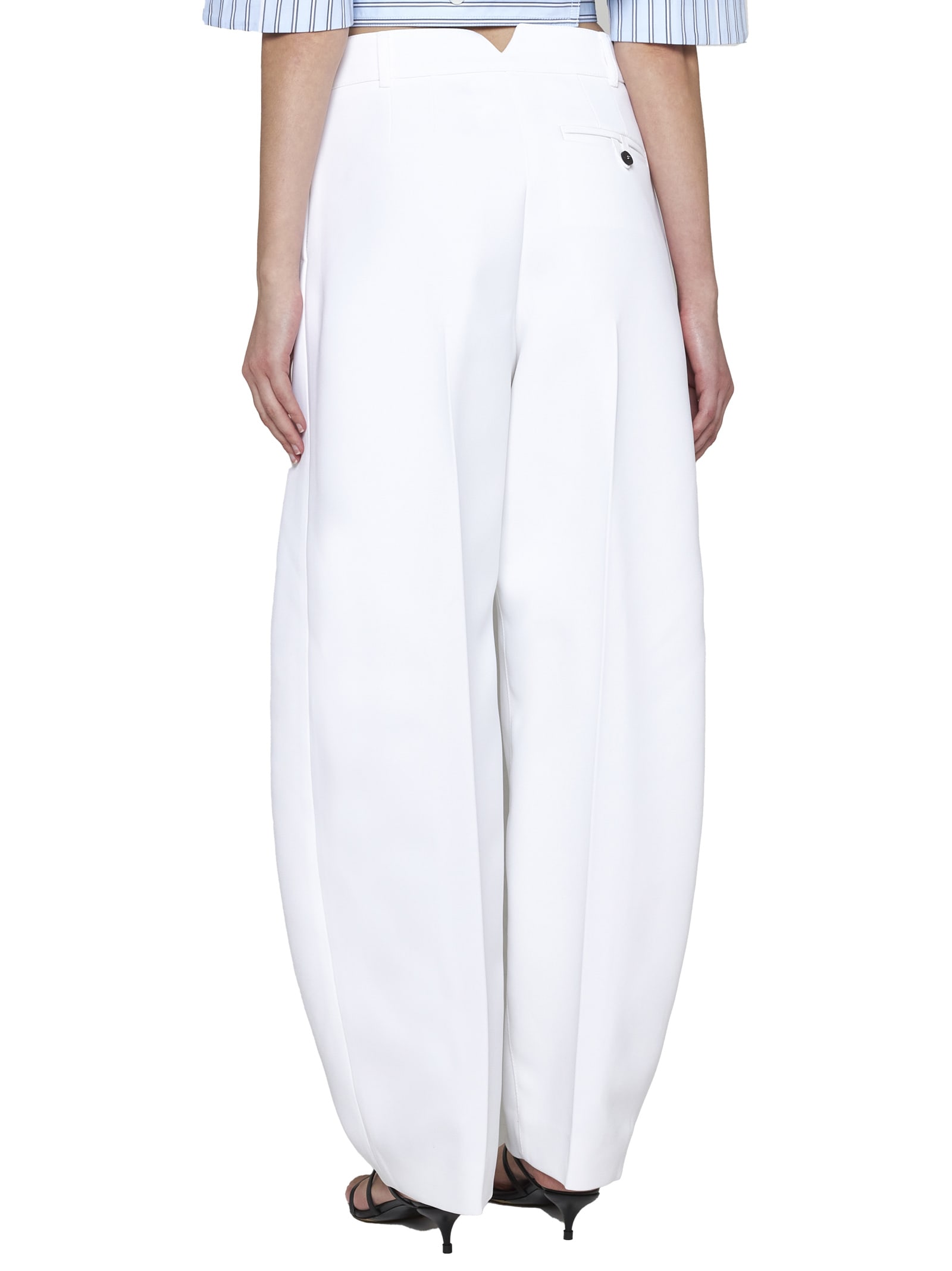 Shop Jacquemus Pants In White