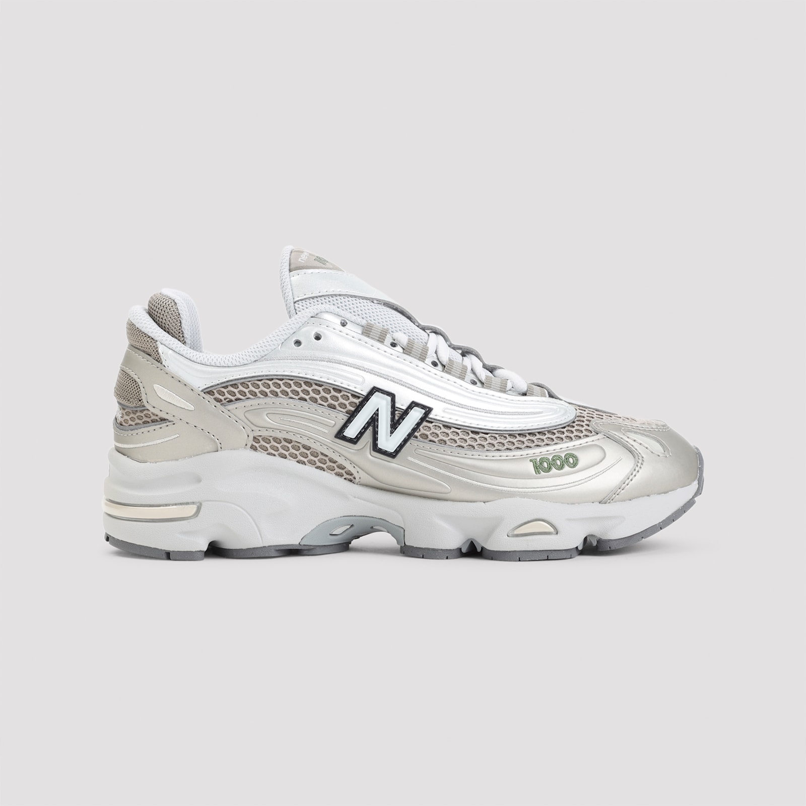 New Balance Contemporary Sneakers Featuring Mesh Panels And Reflective Accents In White