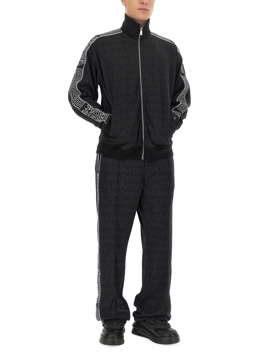 Shop Versace Jogging Pants In Black