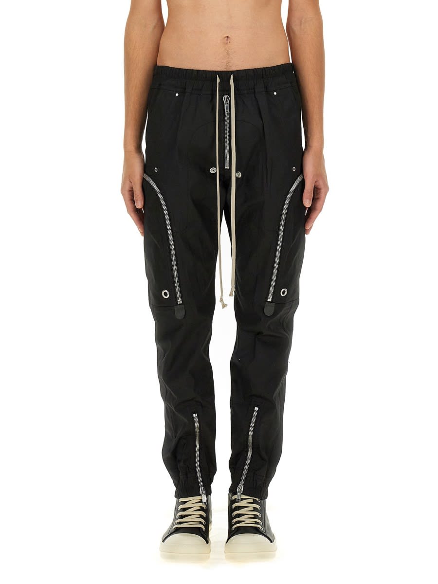 Shop Rick Owens Zip Pocket Laced Trousers In Black