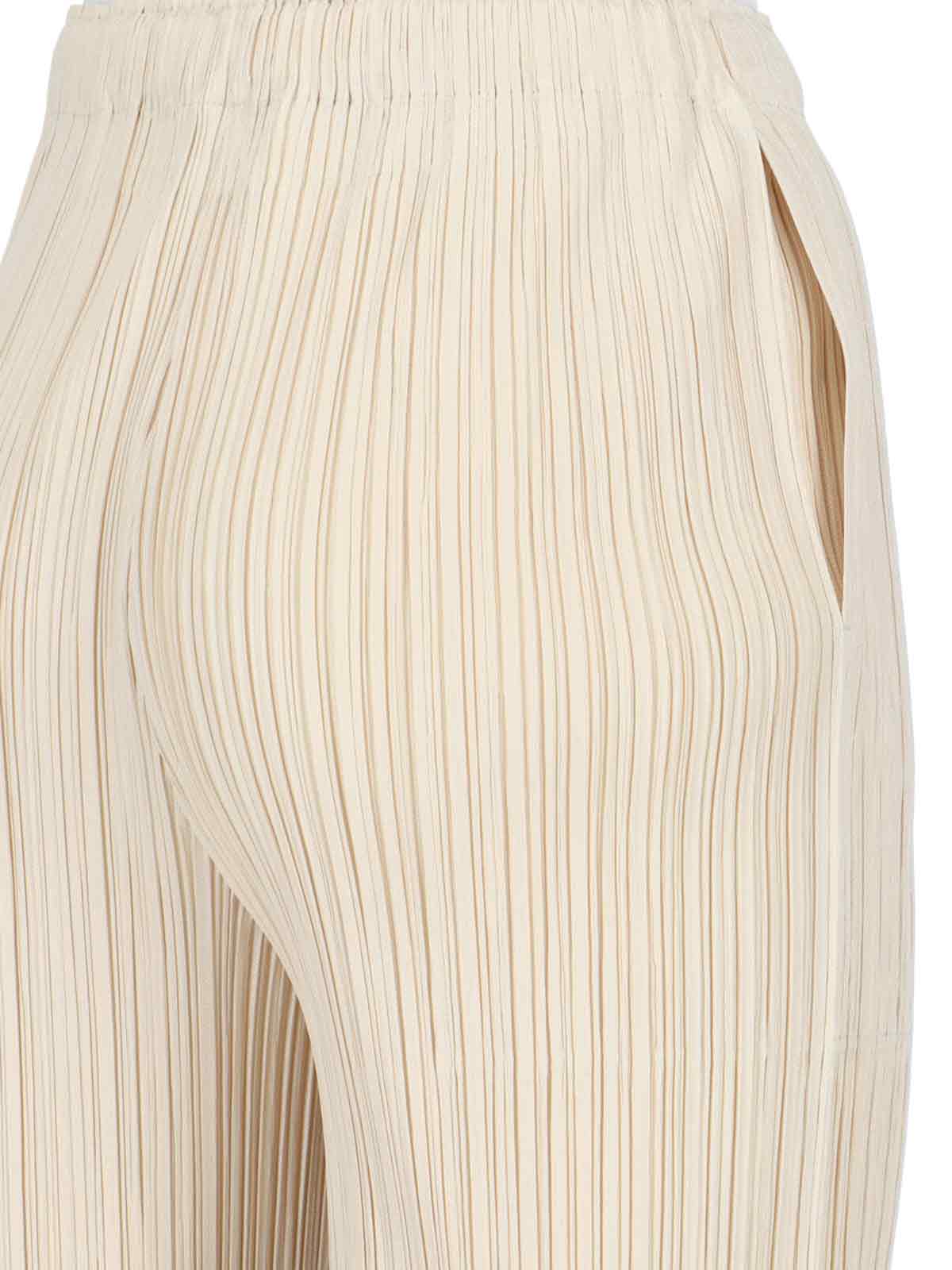 Shop Issey Miyake Pleated Trousers In Beige