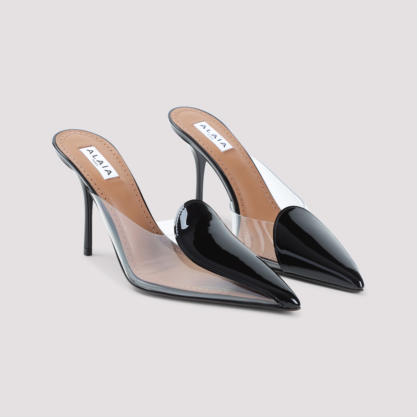 Shop Alaïa 90 Mules In Noir