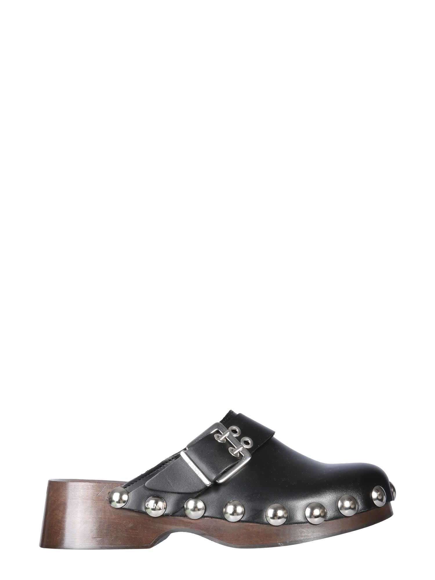 Ganni Buckled Strap Studded Leather Clogs In Black
