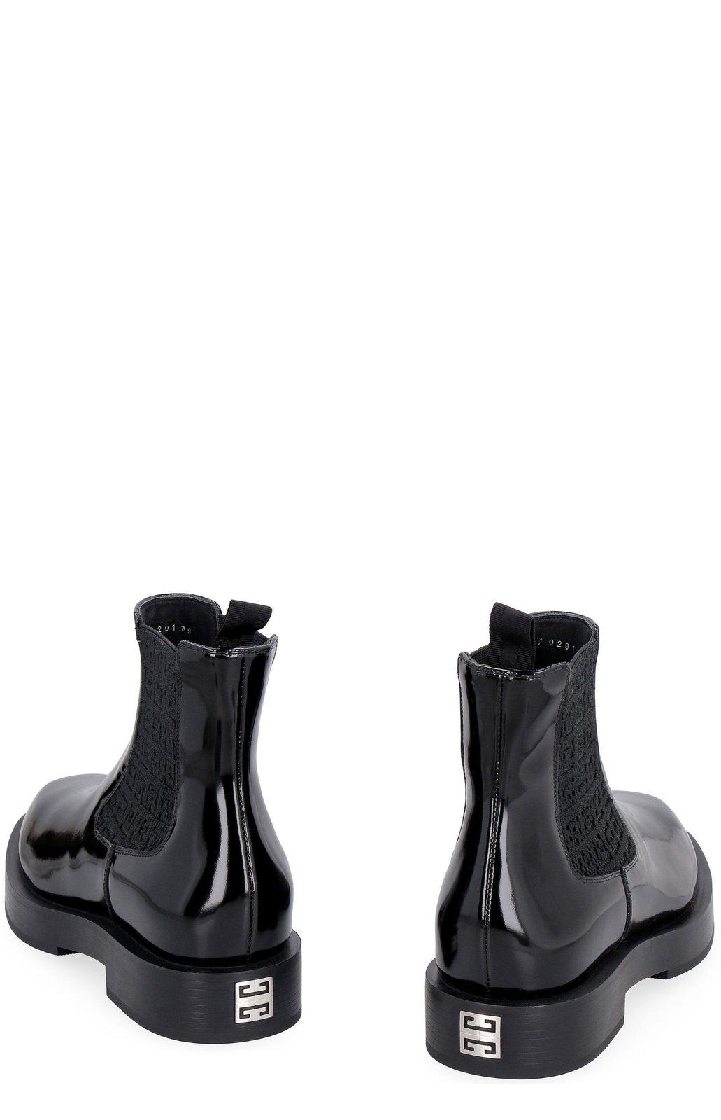 Shop Givenchy Round Toe Ankle Boots In Black