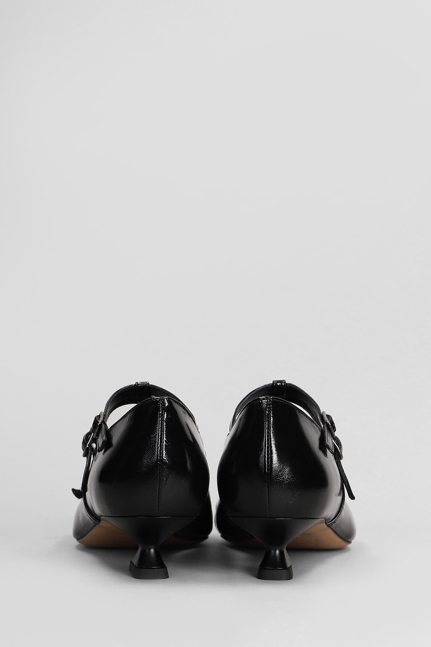 Shop The Seller Pumps In Black Patent Leather