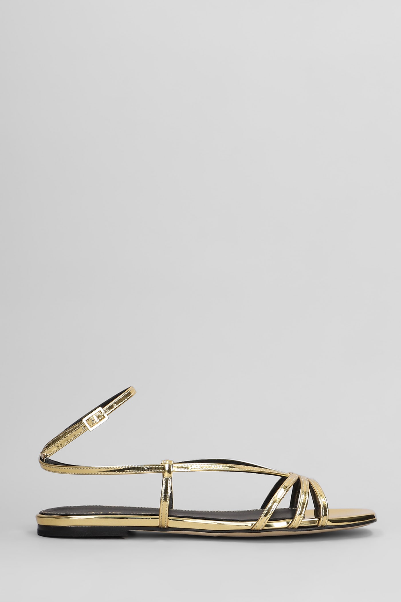 Flats In Gold Leather