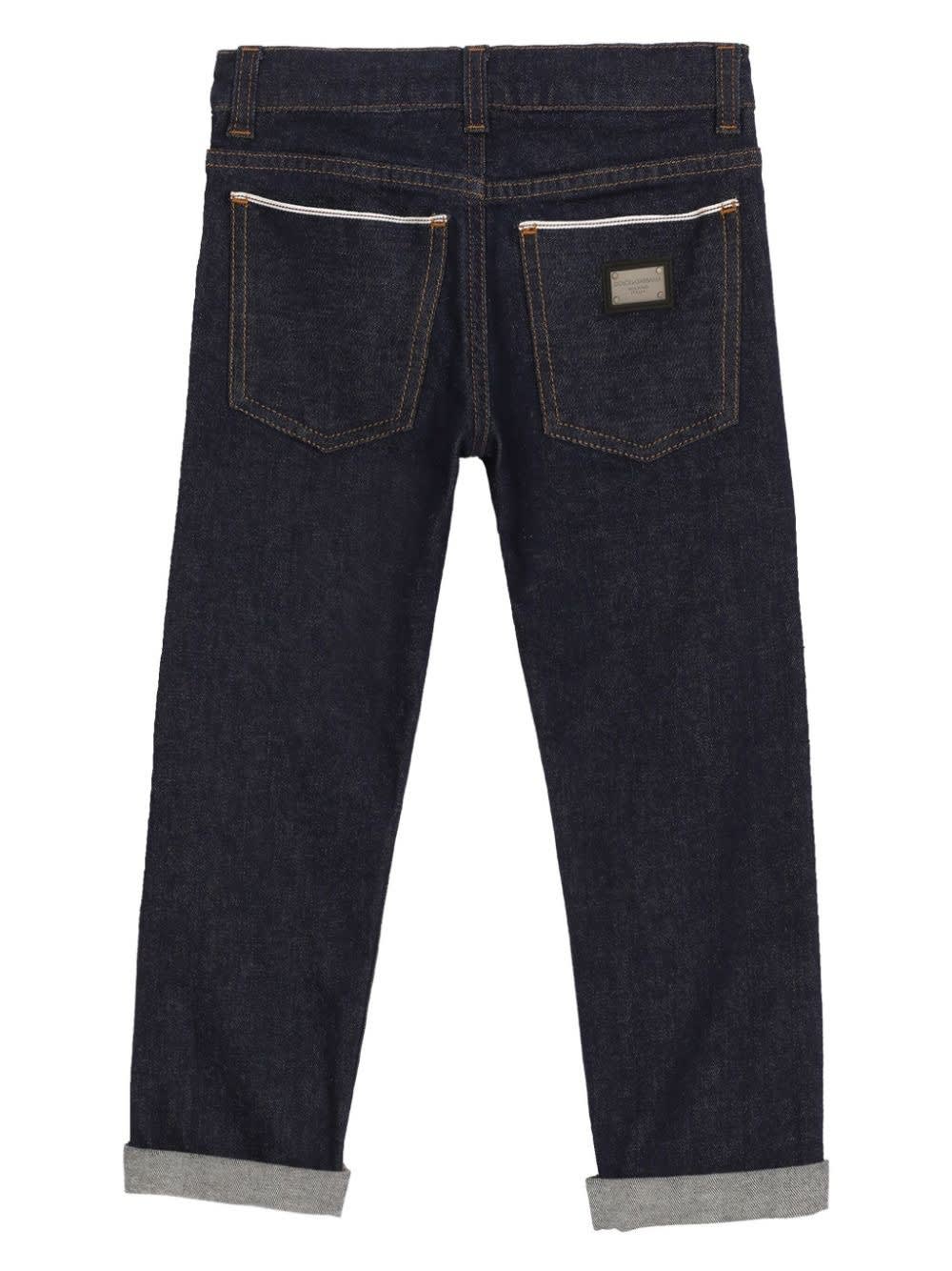 Shop Dolce & Gabbana Blue 5 Pocket Stretch Denim Jeans With Logo Plaque