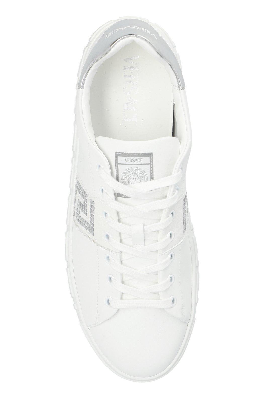 Shop Versace Greca-detailed Lace-up Sneakers In White