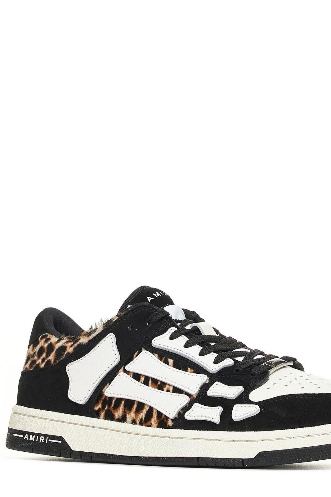 Shop Amiri Skeleton Patch Round Toe Sneakers In Black/white