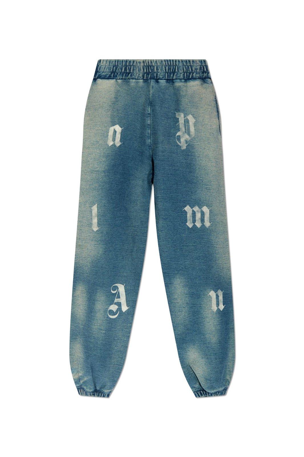 Shop Palm Angels Letter Printed Elastic Waistband Jeans In Blu