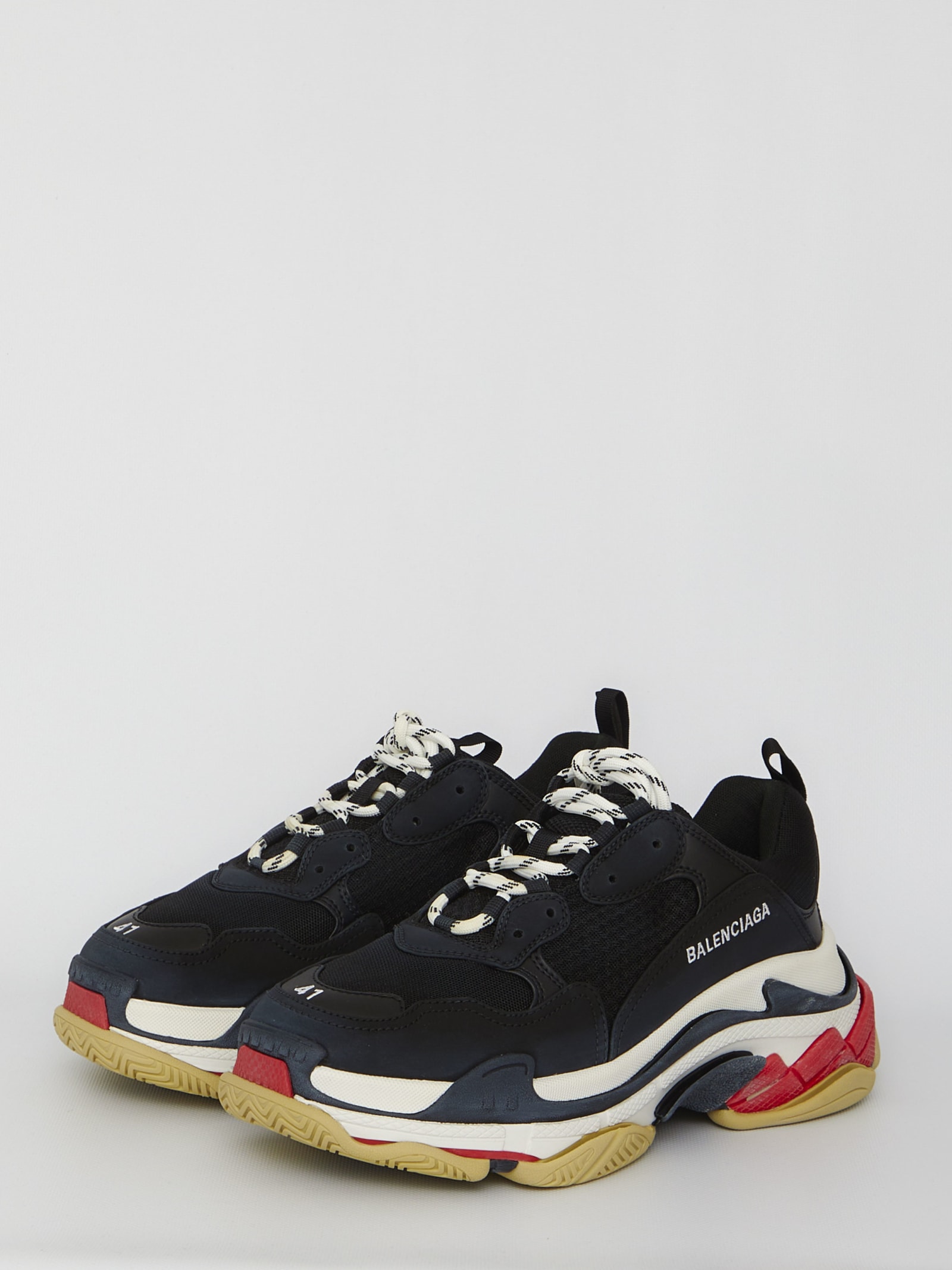 Shop Balenciaga Triple S Sneakers In Black