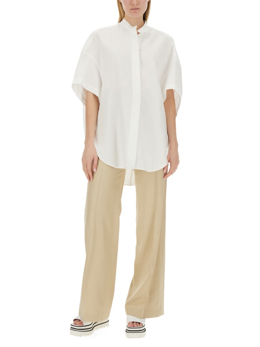 Shop Stella Mccartney Flare Fit Pants In Beige