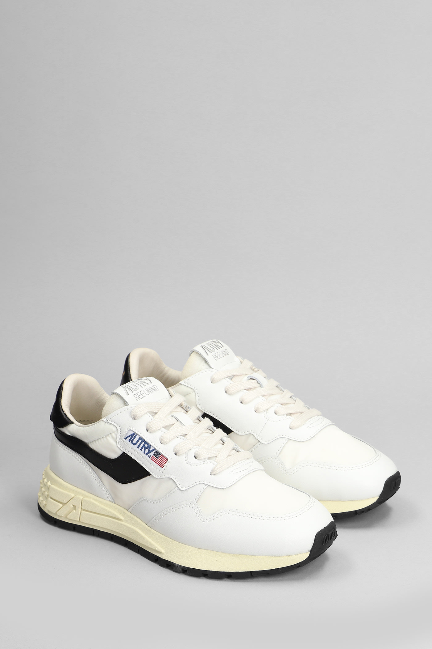 Shop Autry Reelwind Low Sneakers In White Leather And Fabric In White/black