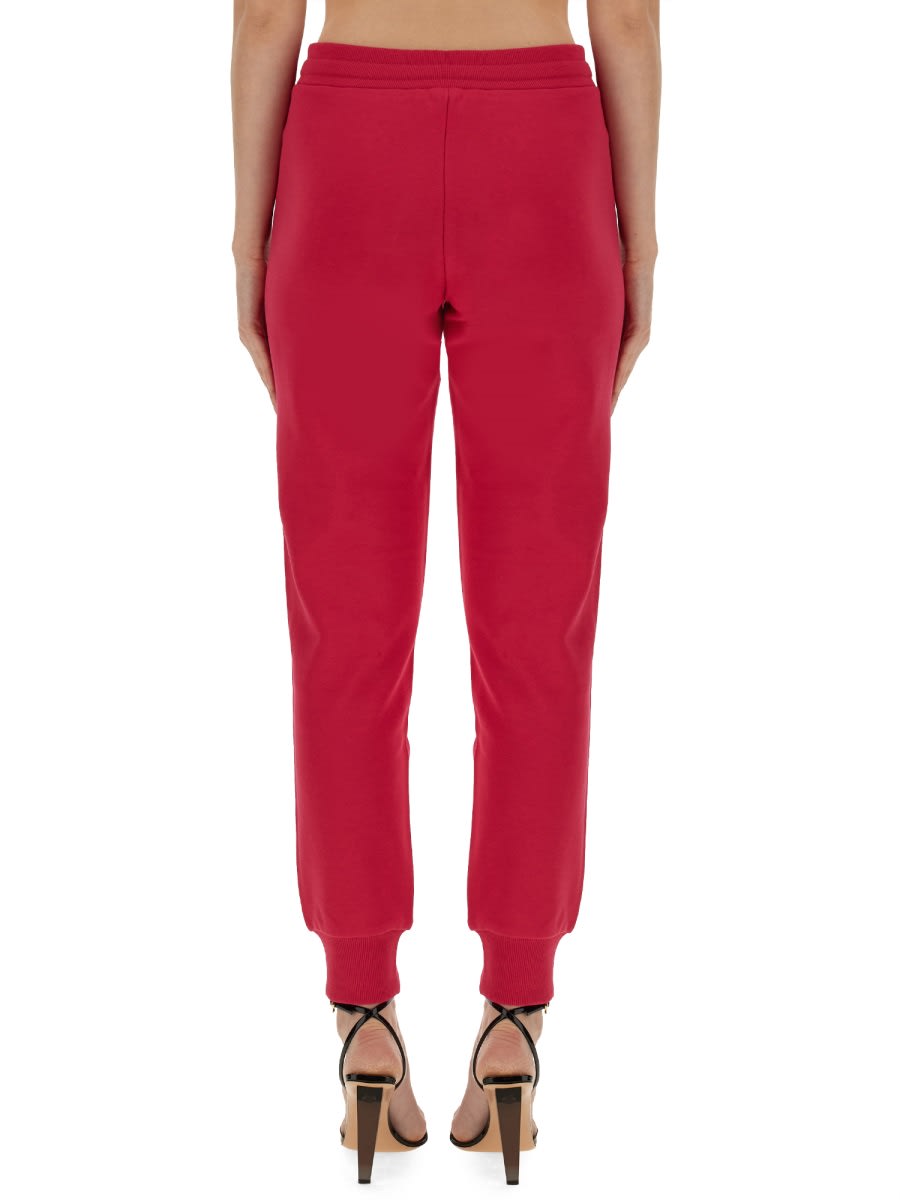 Shop Versace Jeans Couture Jogging Pants In Pink