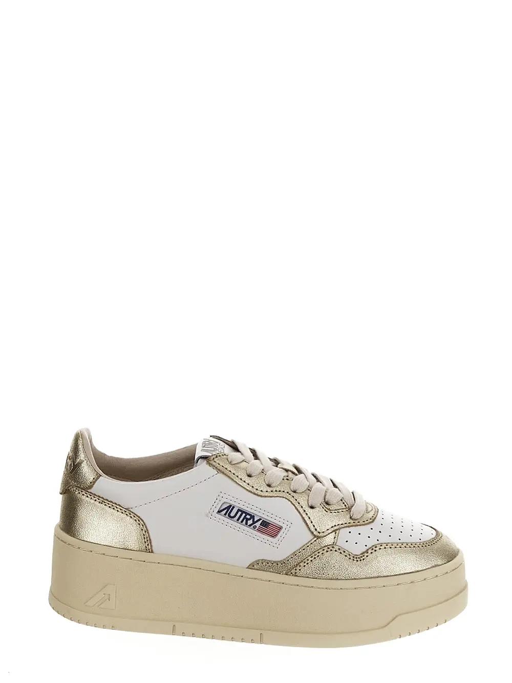 Shop Autry Platform Low Sneakers In Golden