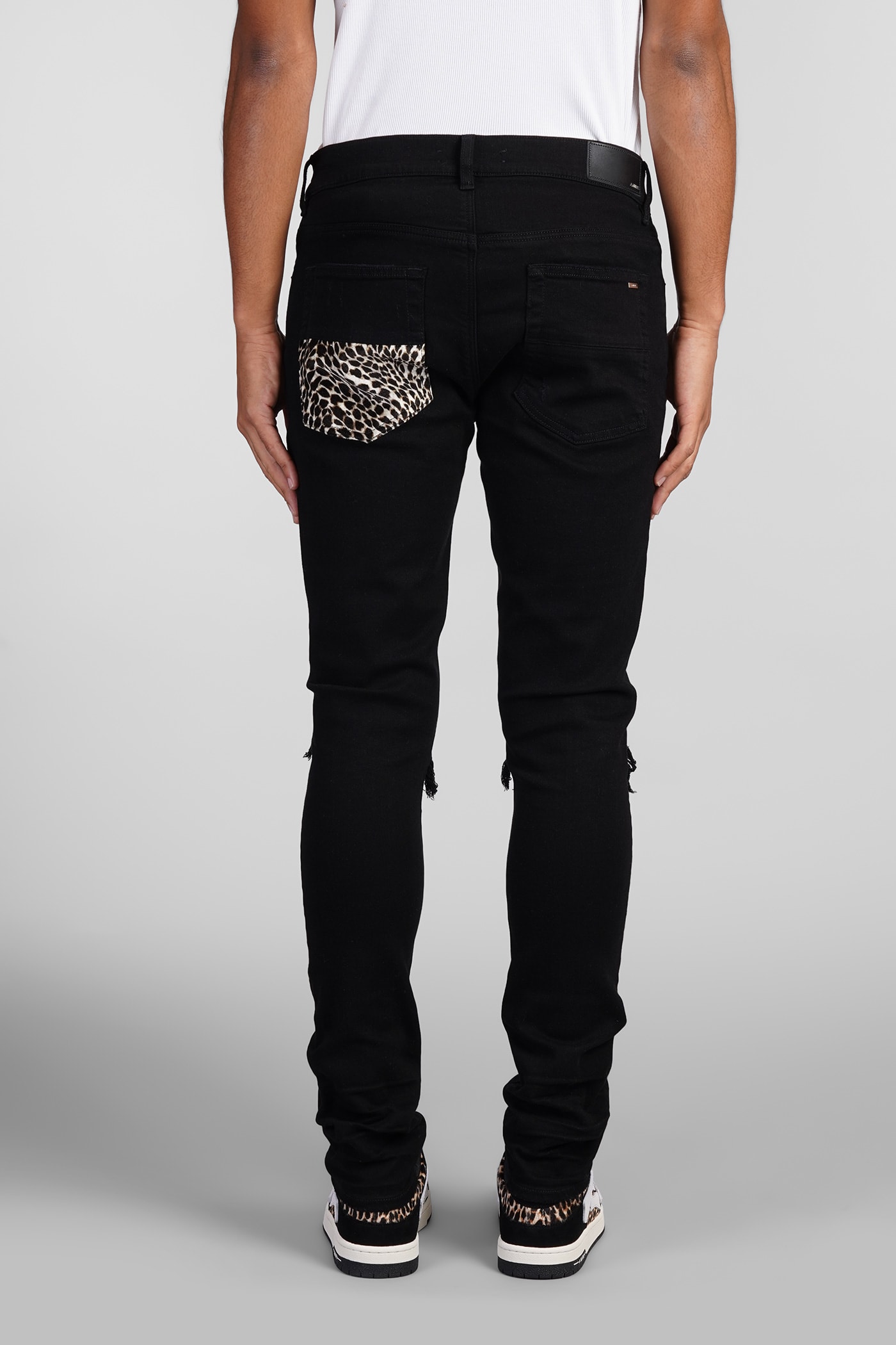 Shop Amiri Jeans In Black Cotton