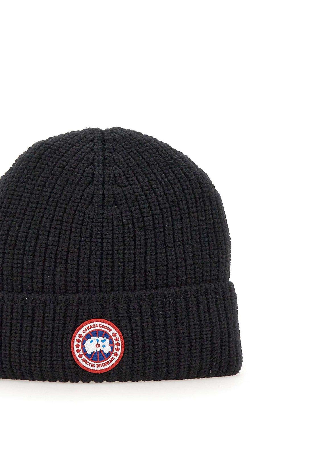 Shop Canada Goose Logo Patch Knitted Beanie In Black