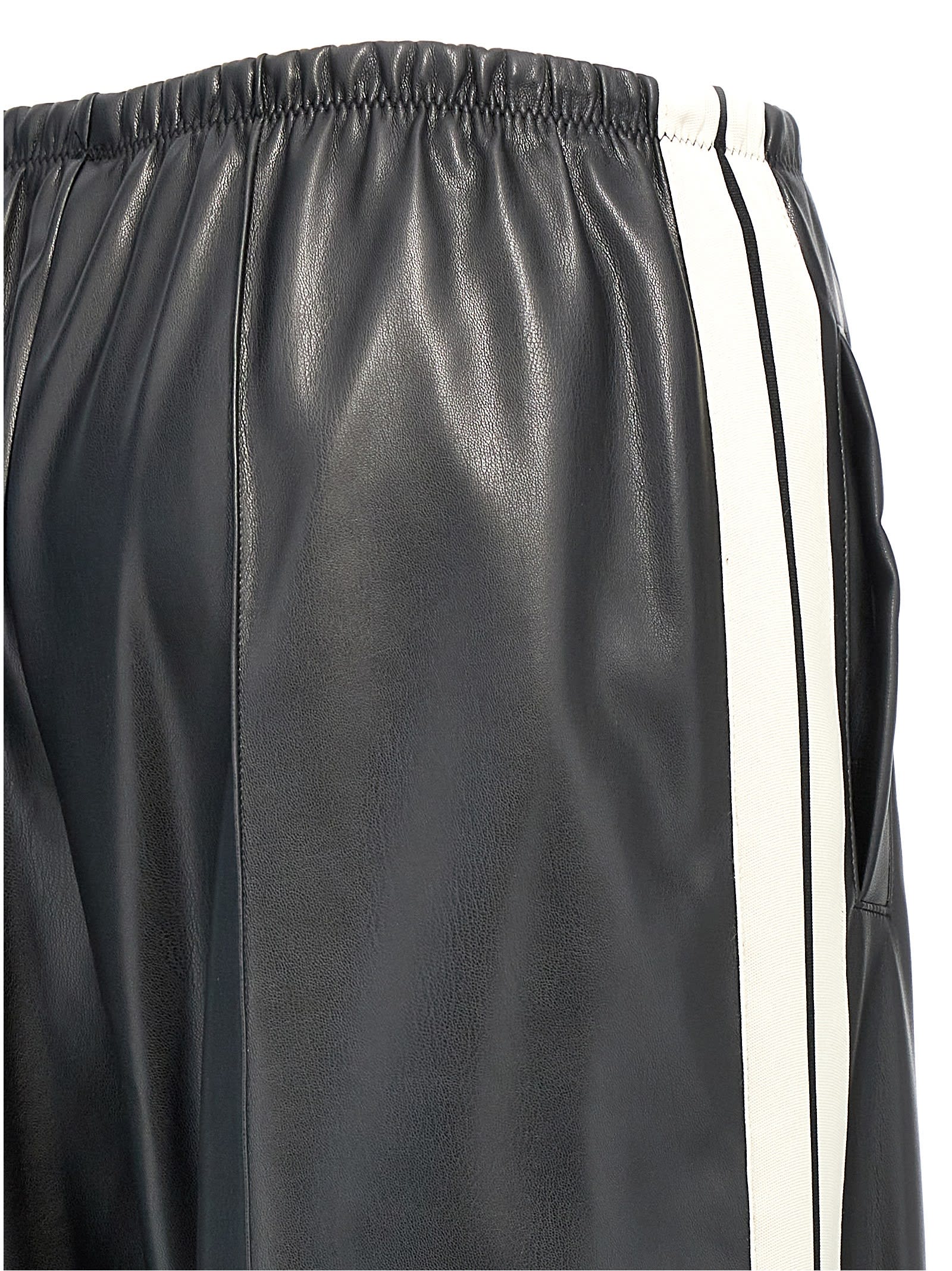 Shop Palm Angels Leather Effect Track Loose Pants In White/black