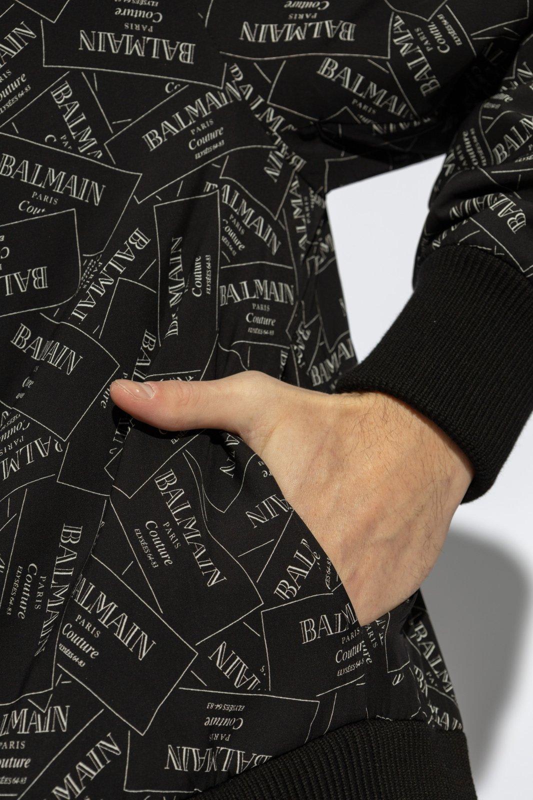 Shop Balmain Printed Logo Label Bomber Jacket In Black
