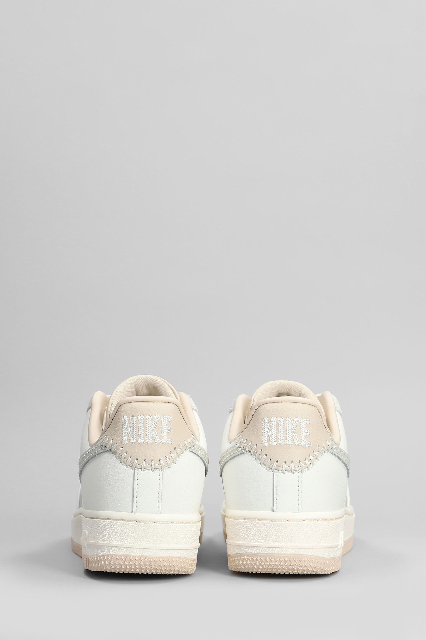 Nike Air Force 1 07 Sneakers In Beige Leather In White