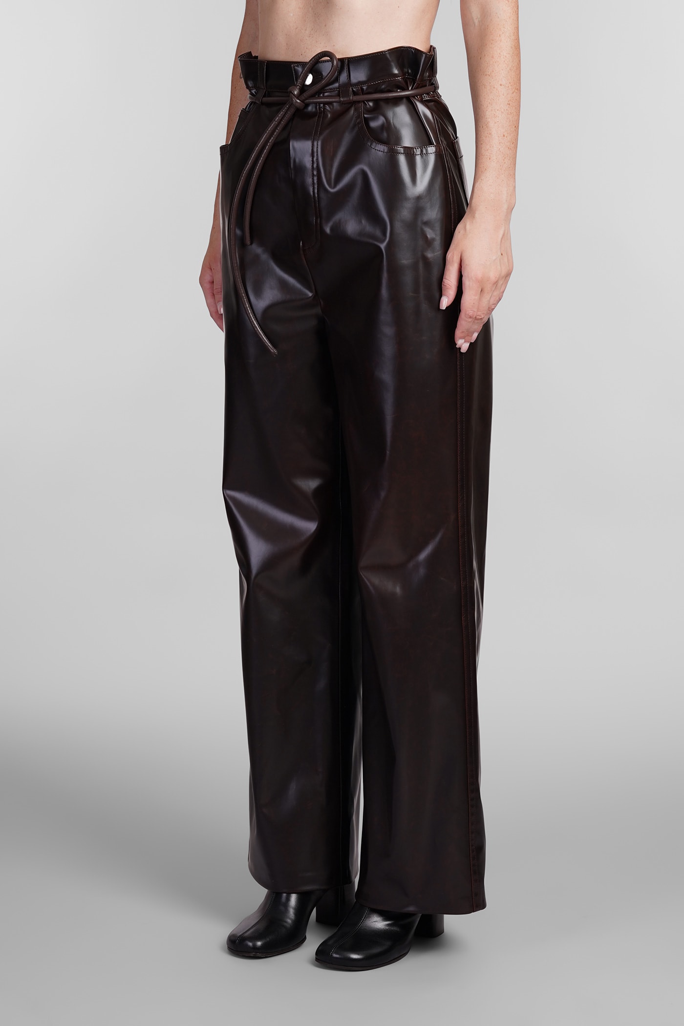 Shop Nanushka Pants In Brown Polyuretan