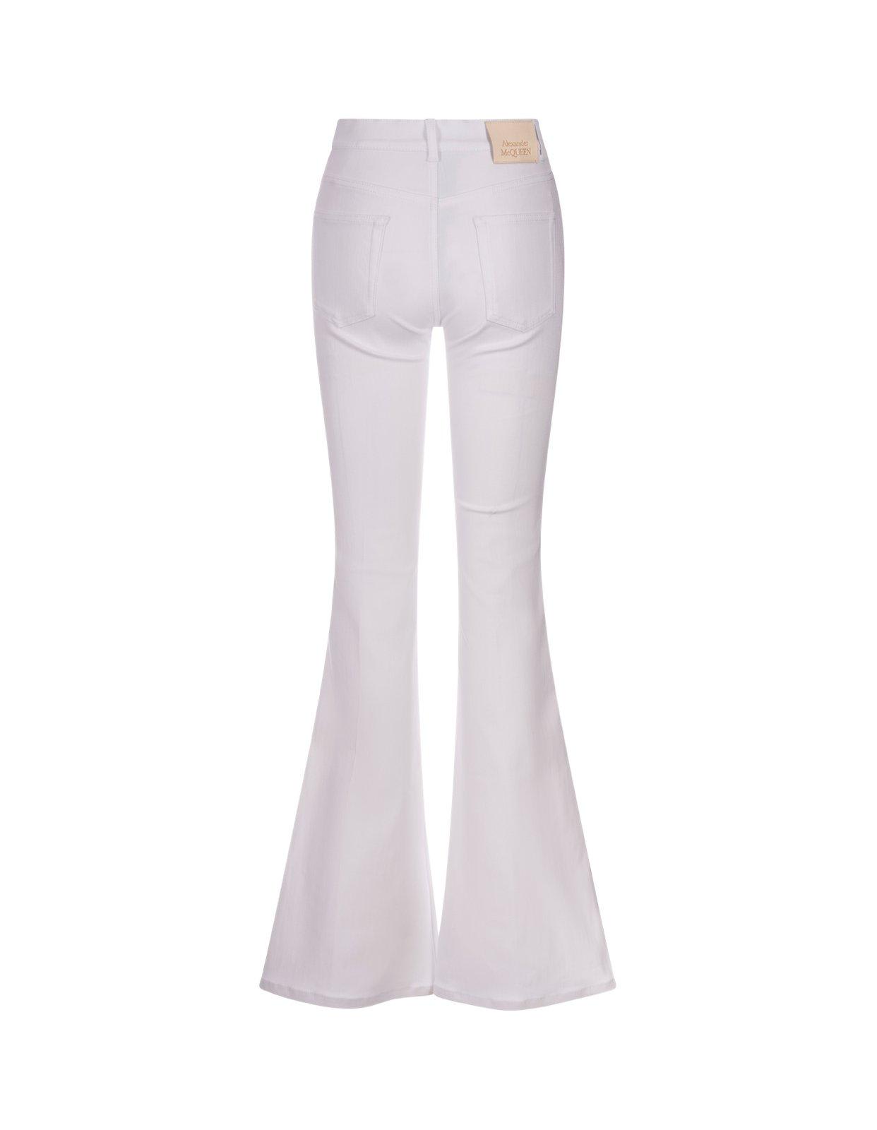 Shop Alexander Mcqueen Logo Patch Flared Jeans In Optical White