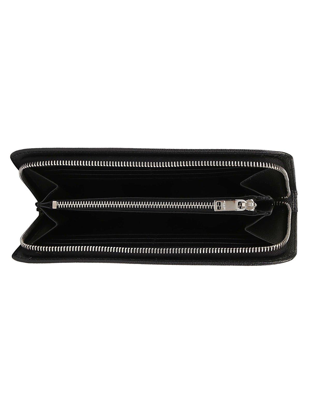 Shop Saint Laurent Logo Detailed Zip-up Wallet In Black