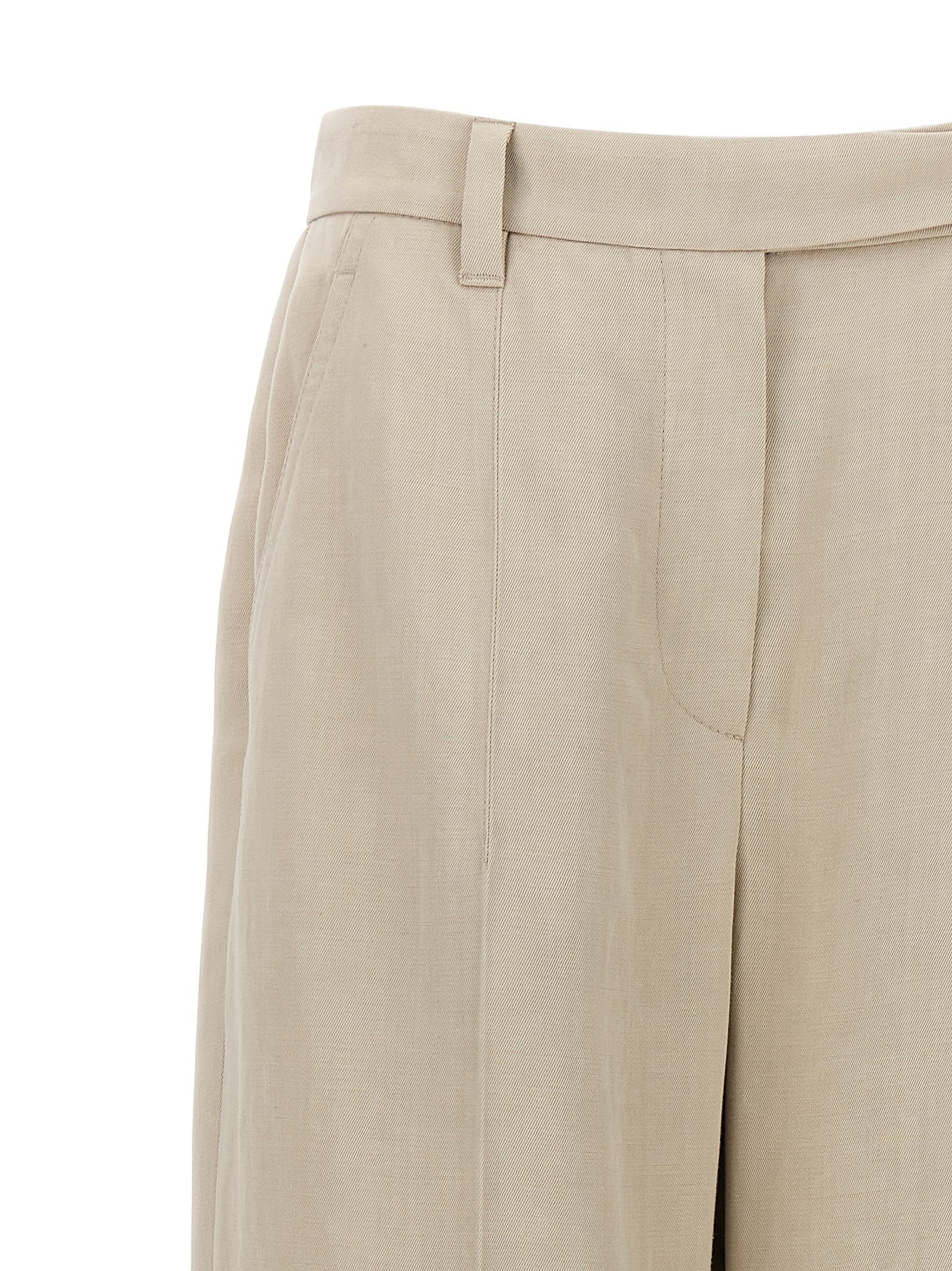 Shop Brunello Cucinelli Pants With Front Pleats In Beige