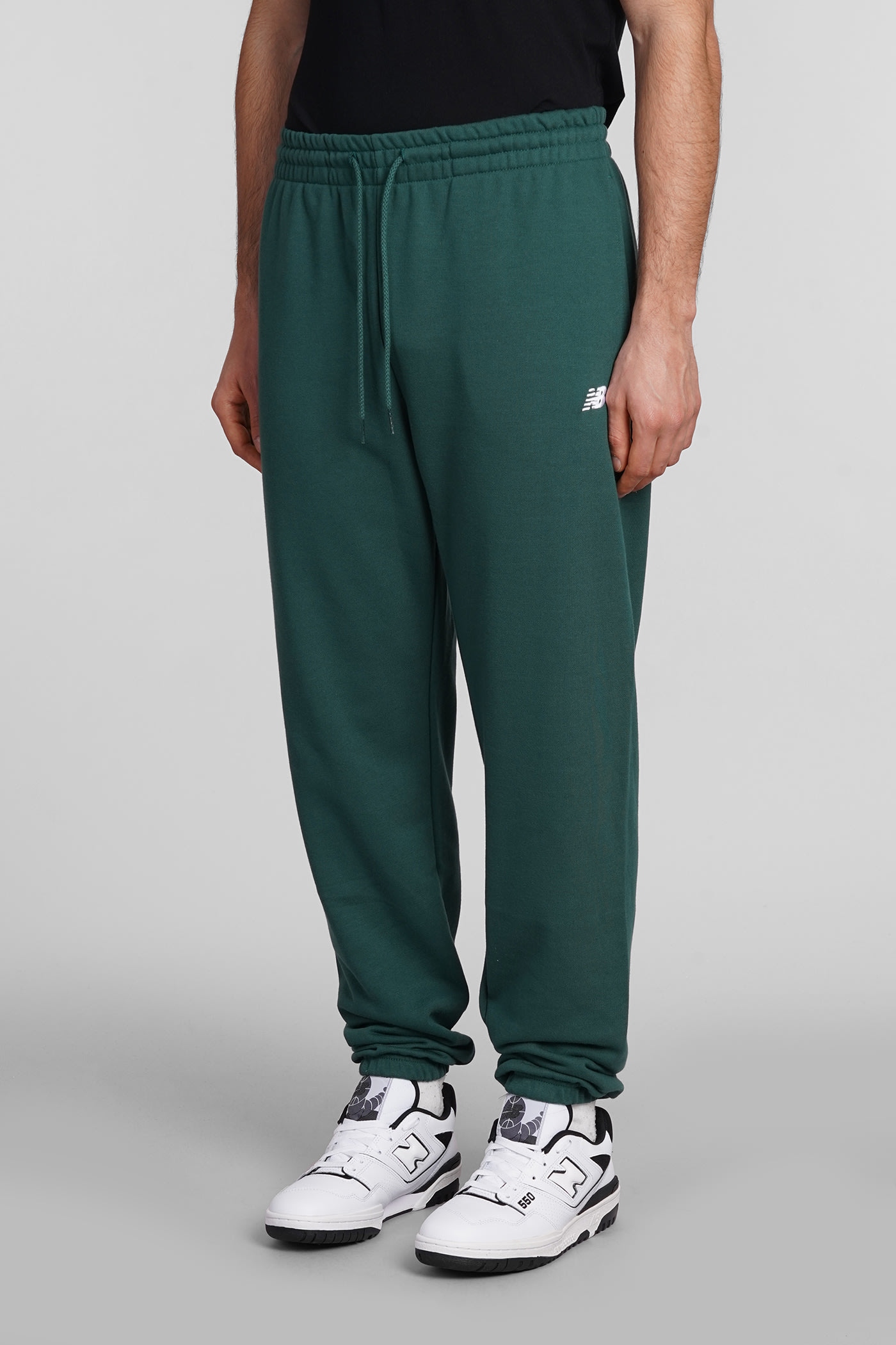 Shop New Balance Pants In Green Cotton