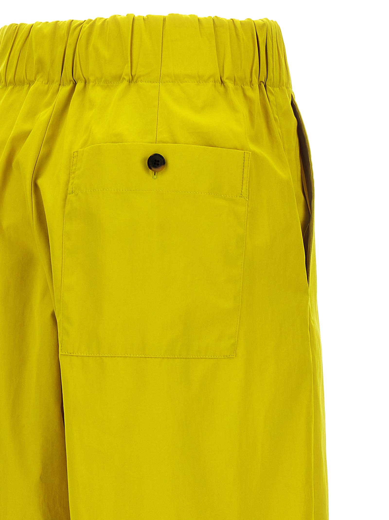 Shop Dries Van Noten Pila Trousers In Yellow