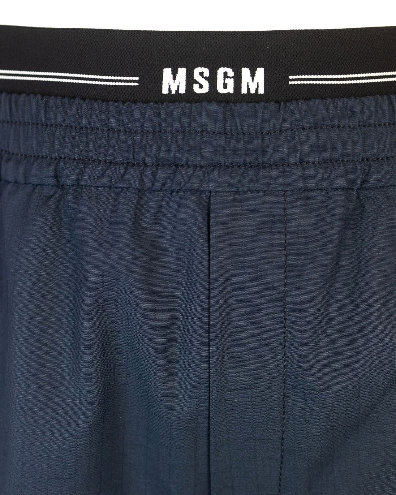 Shop Msgm Logo Waistband Straight Leg Trousers In Blue