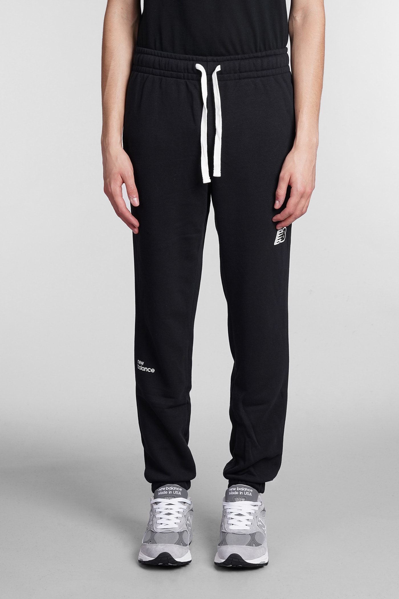 New Balance Pants In Black Cotton ModeSens